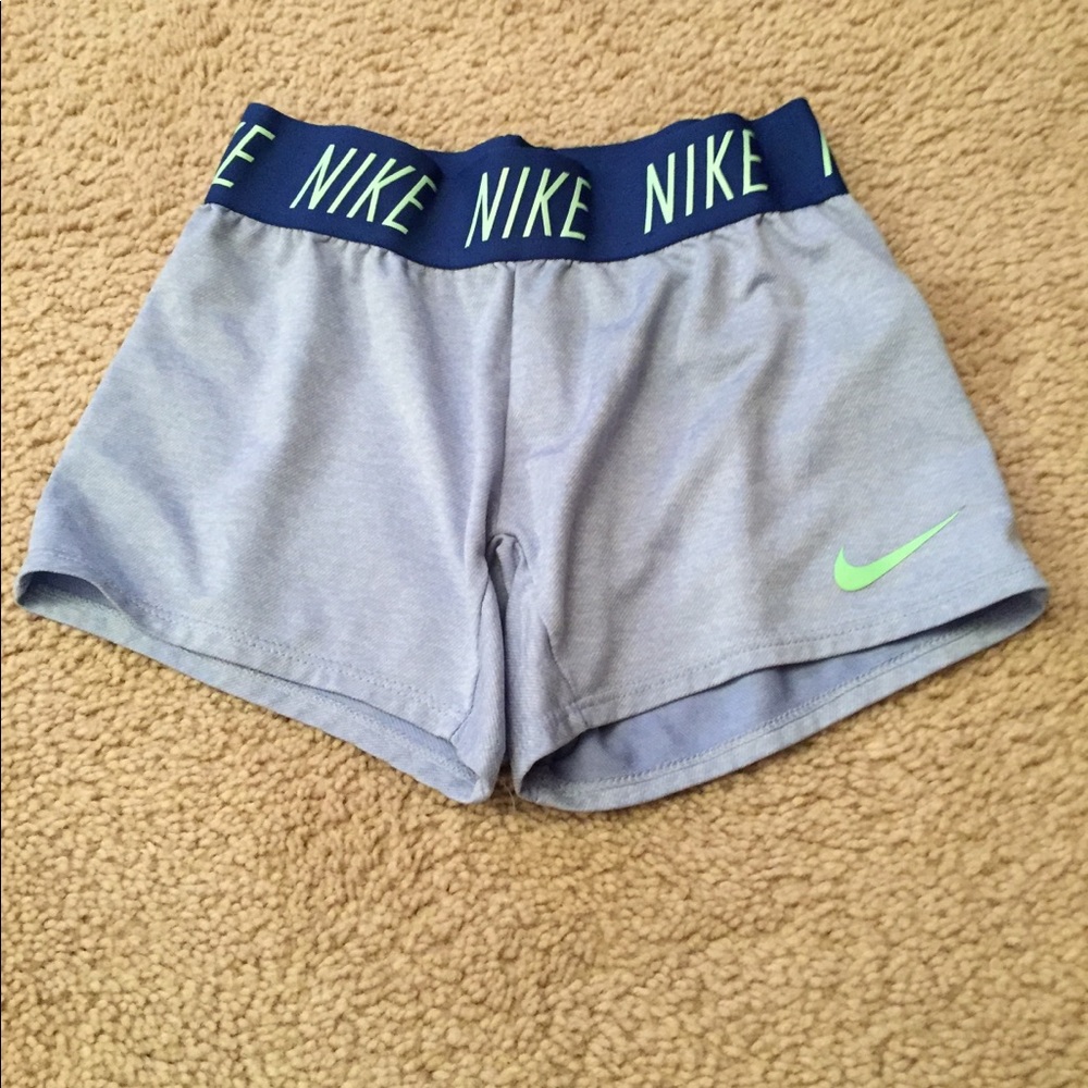 Blue and sea green Nike shorts.